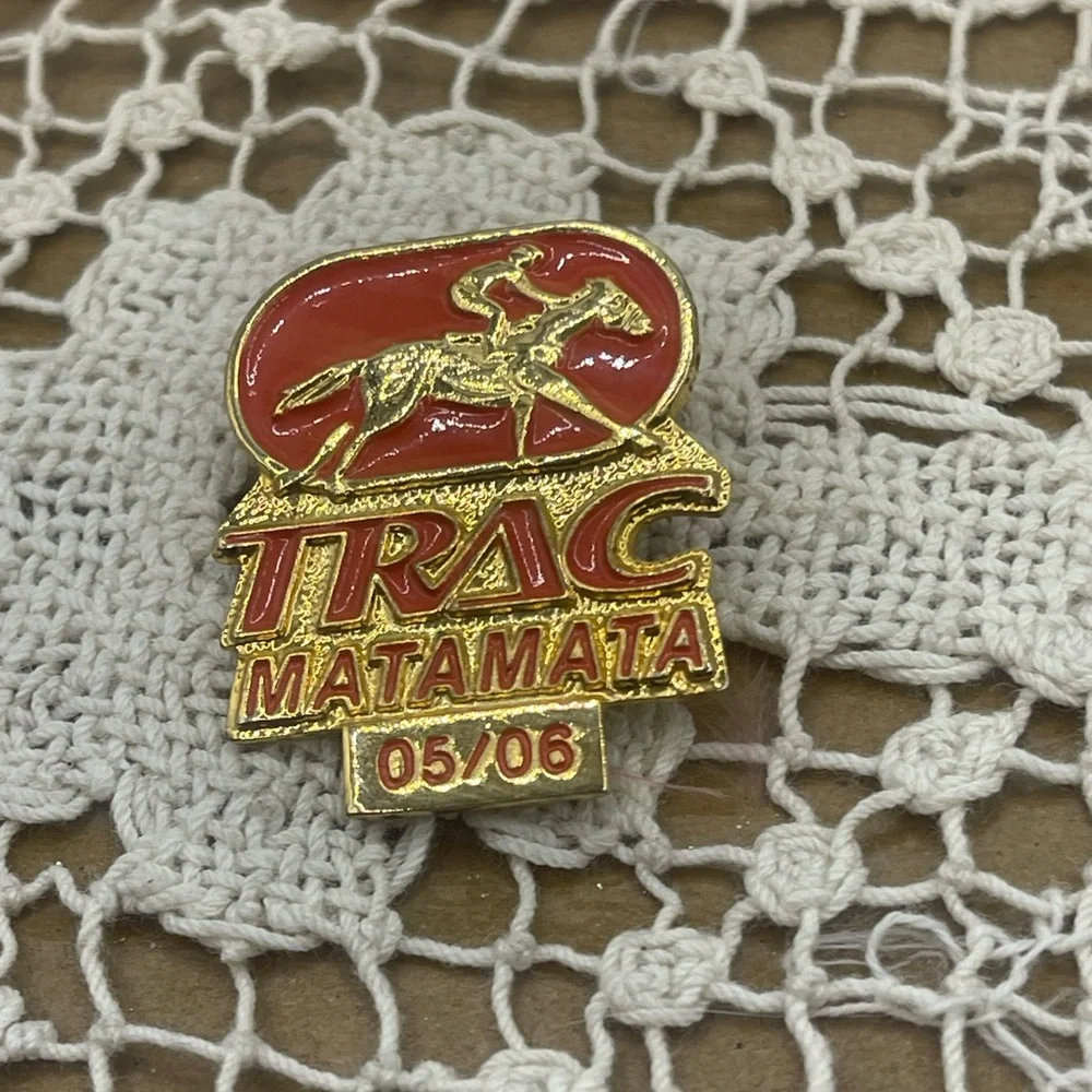 Trac Matamata Gold and Red Collector's Pin‎